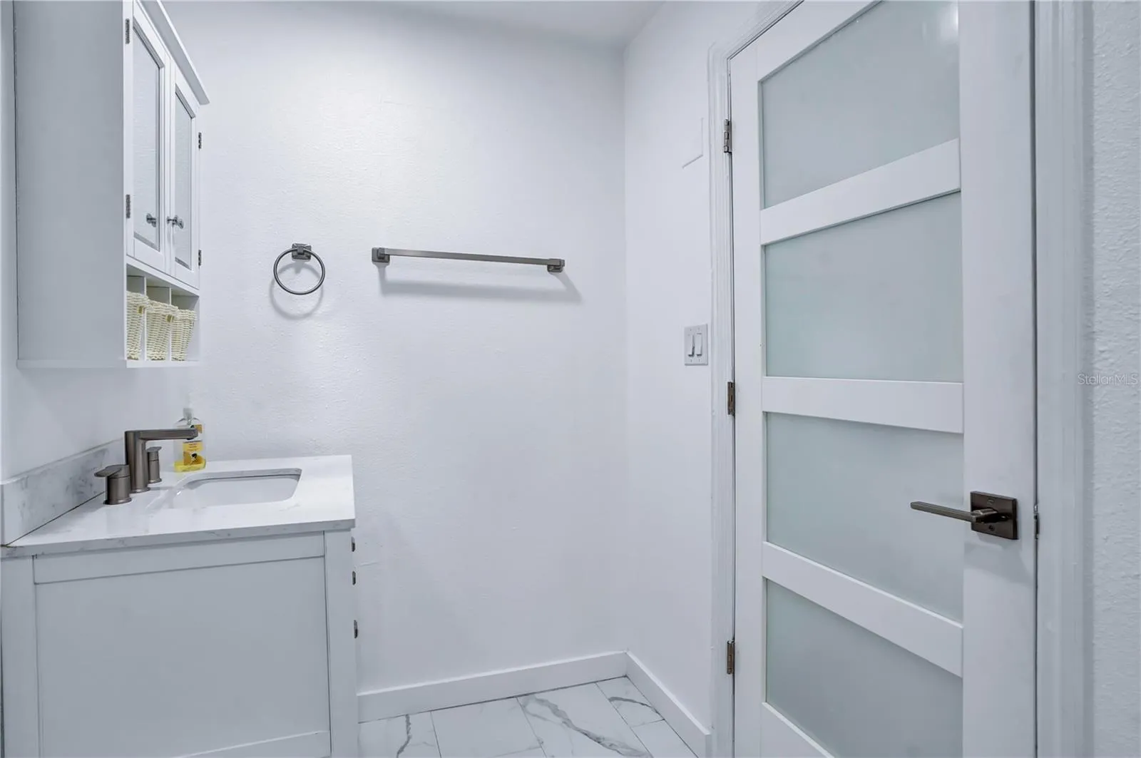 Fully renovated primary bathroom with new door
