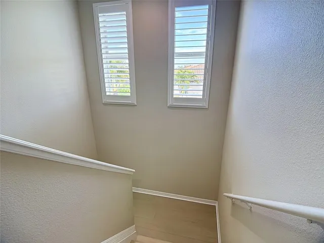 Stairs w/ Luxury Vinyl and Plantation Shutter