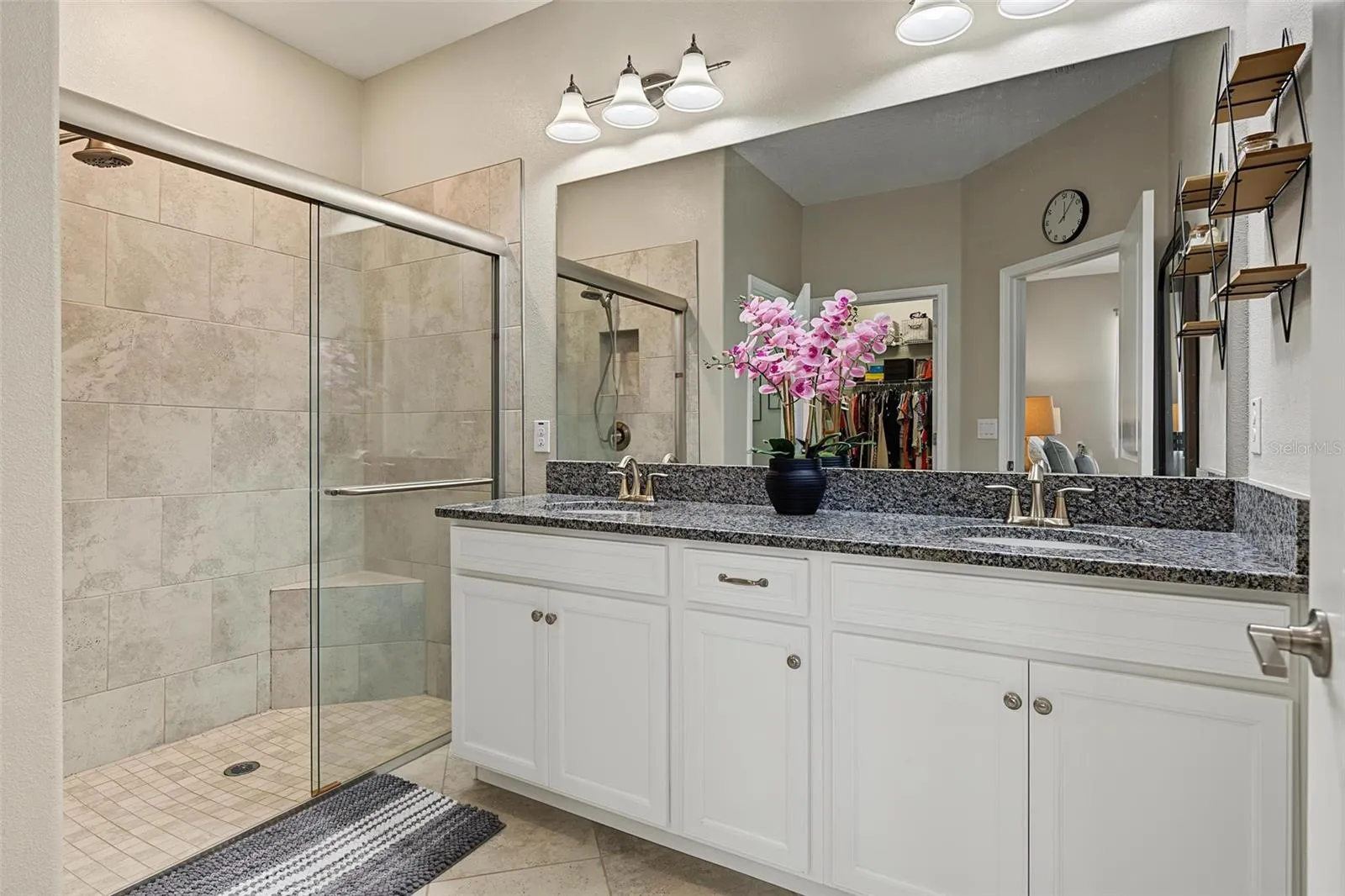 dual sinks, large walk-in shower