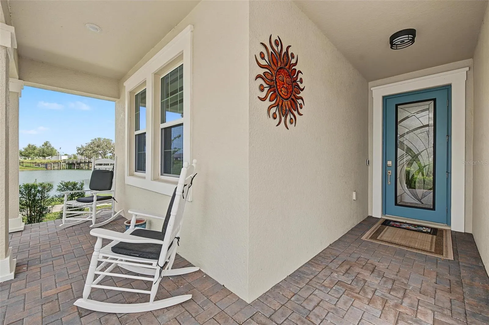 spacious covered front porch w/great view