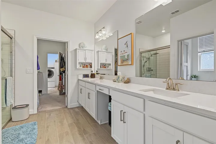So convienent! Bath opens to closet & laundry room