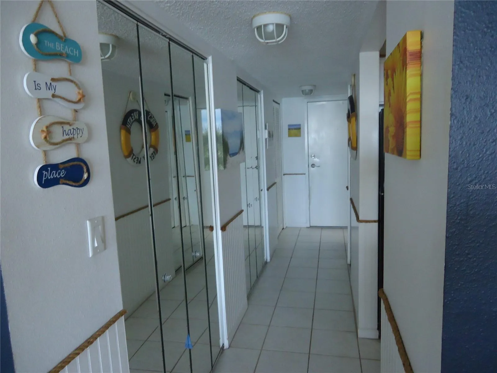 Entrance hallway with closets
