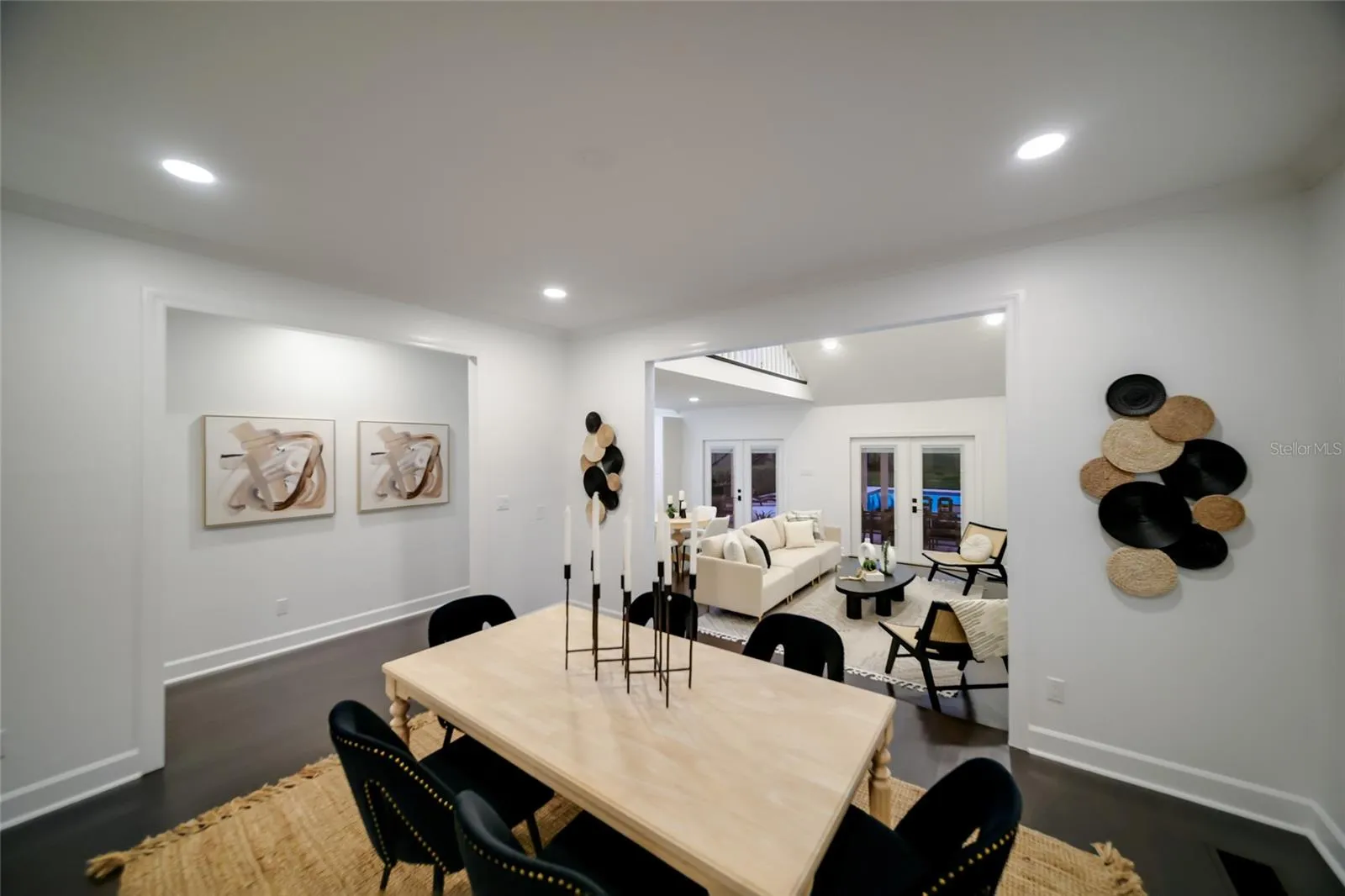 Formal dining room, connected to both living room and family room.