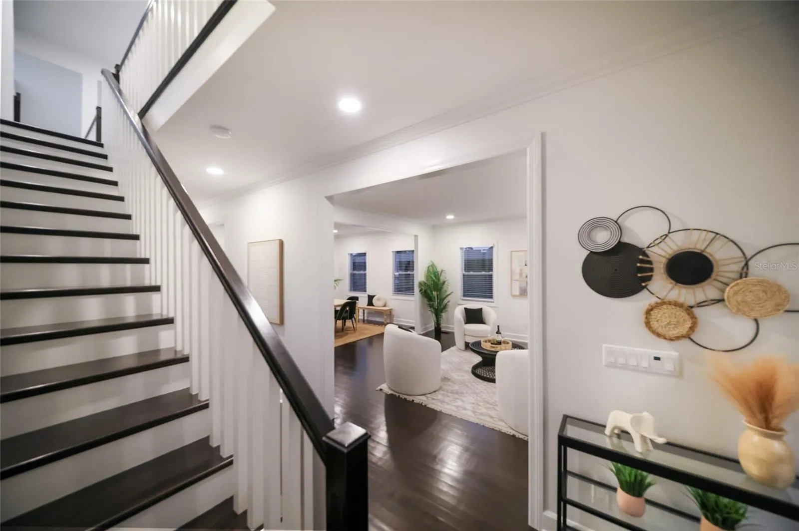 Front stair case leads to additional bedrooms, bathroom, loft and 2nd story deck.