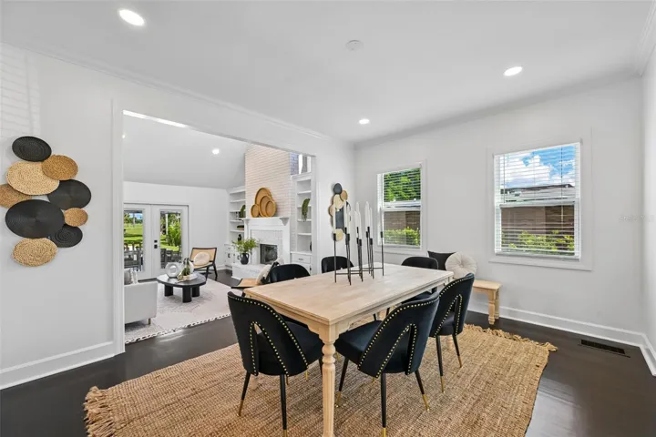 Dining room is spacious and light filled.