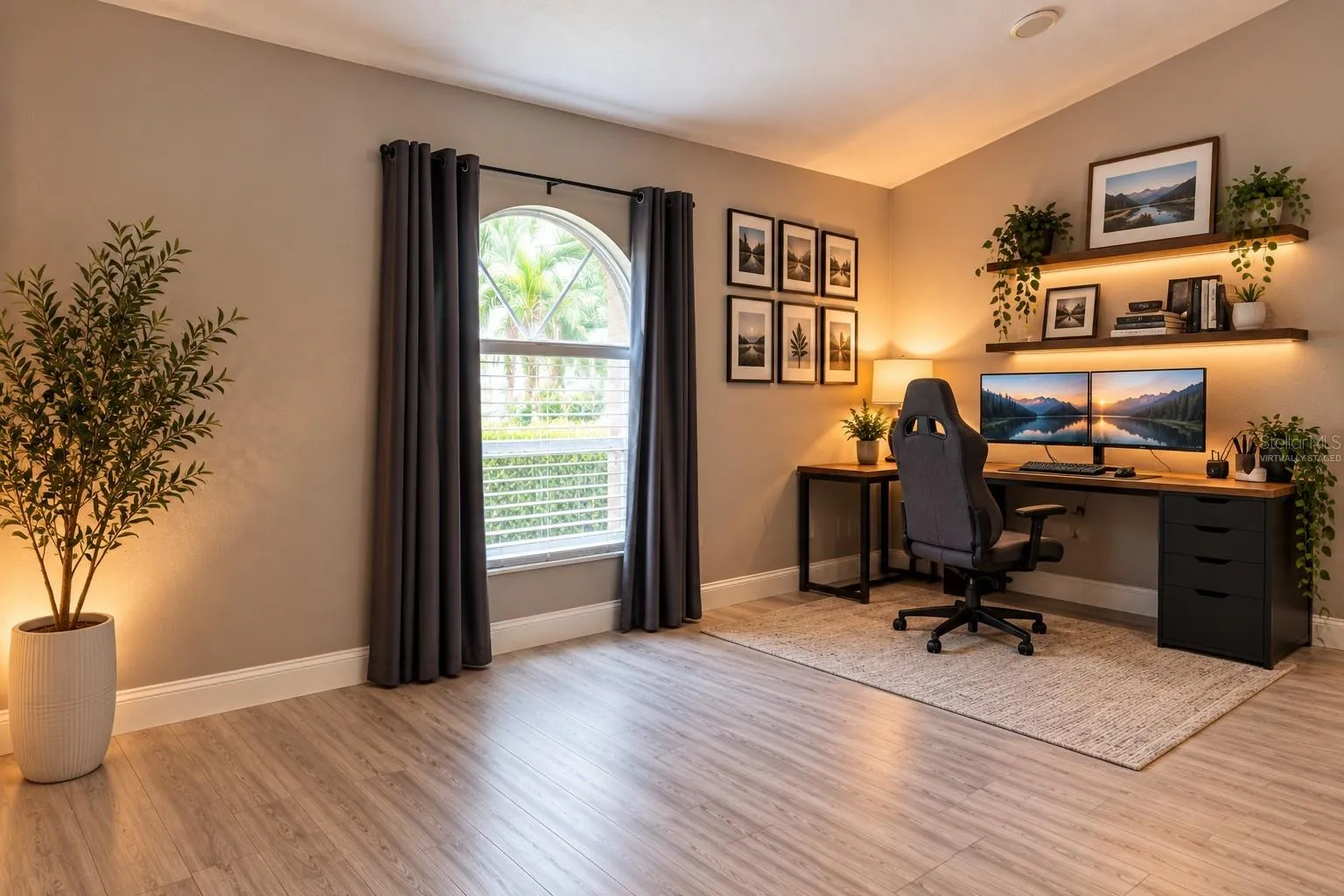 Virtually staged desk area at front of great room.