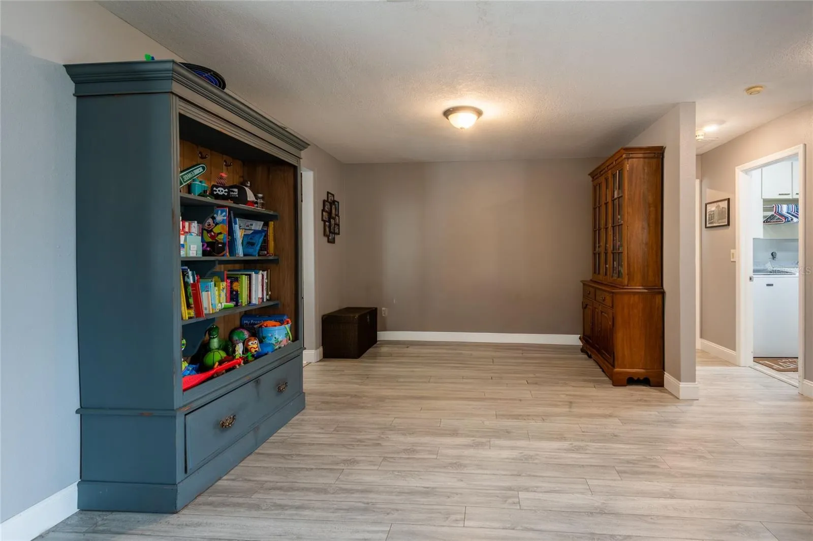 Dining room being used as a kid's play area.