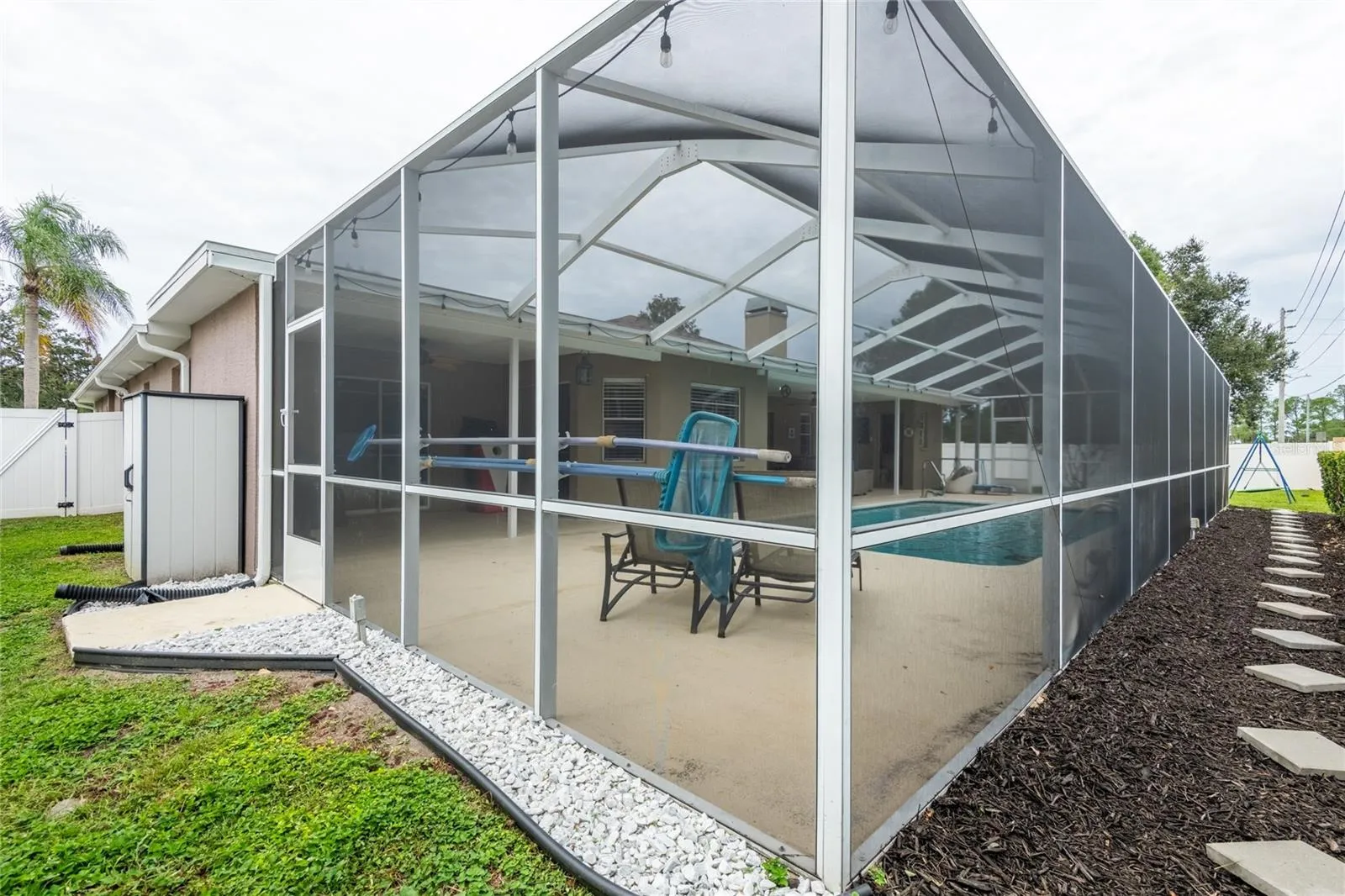 Side yard with a shed.