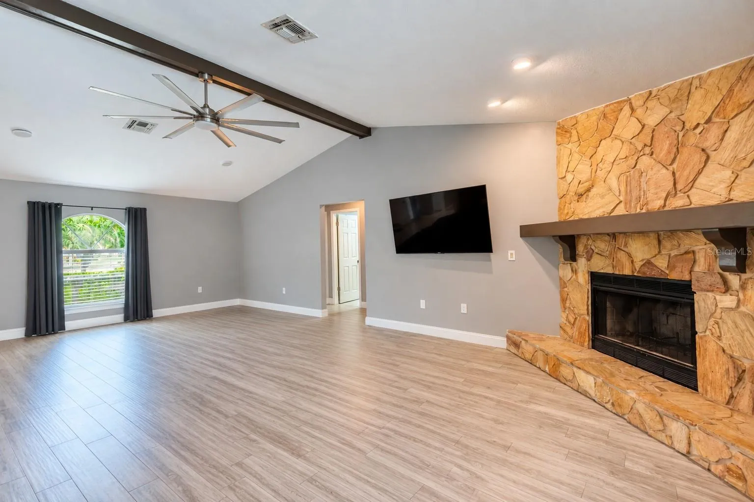 Great room with items virtually removed.