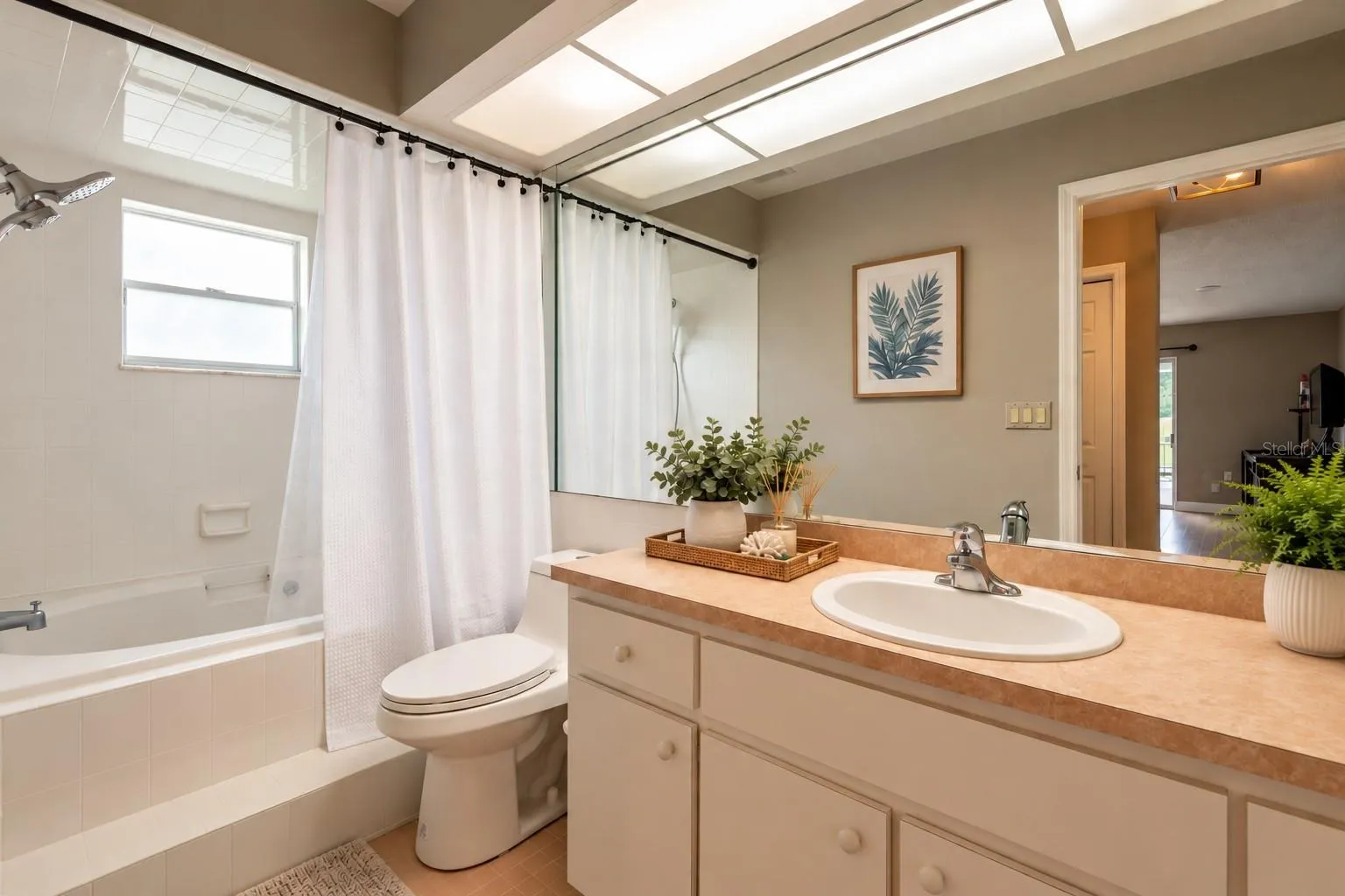 Primary suite with large soaking tub/shower.
