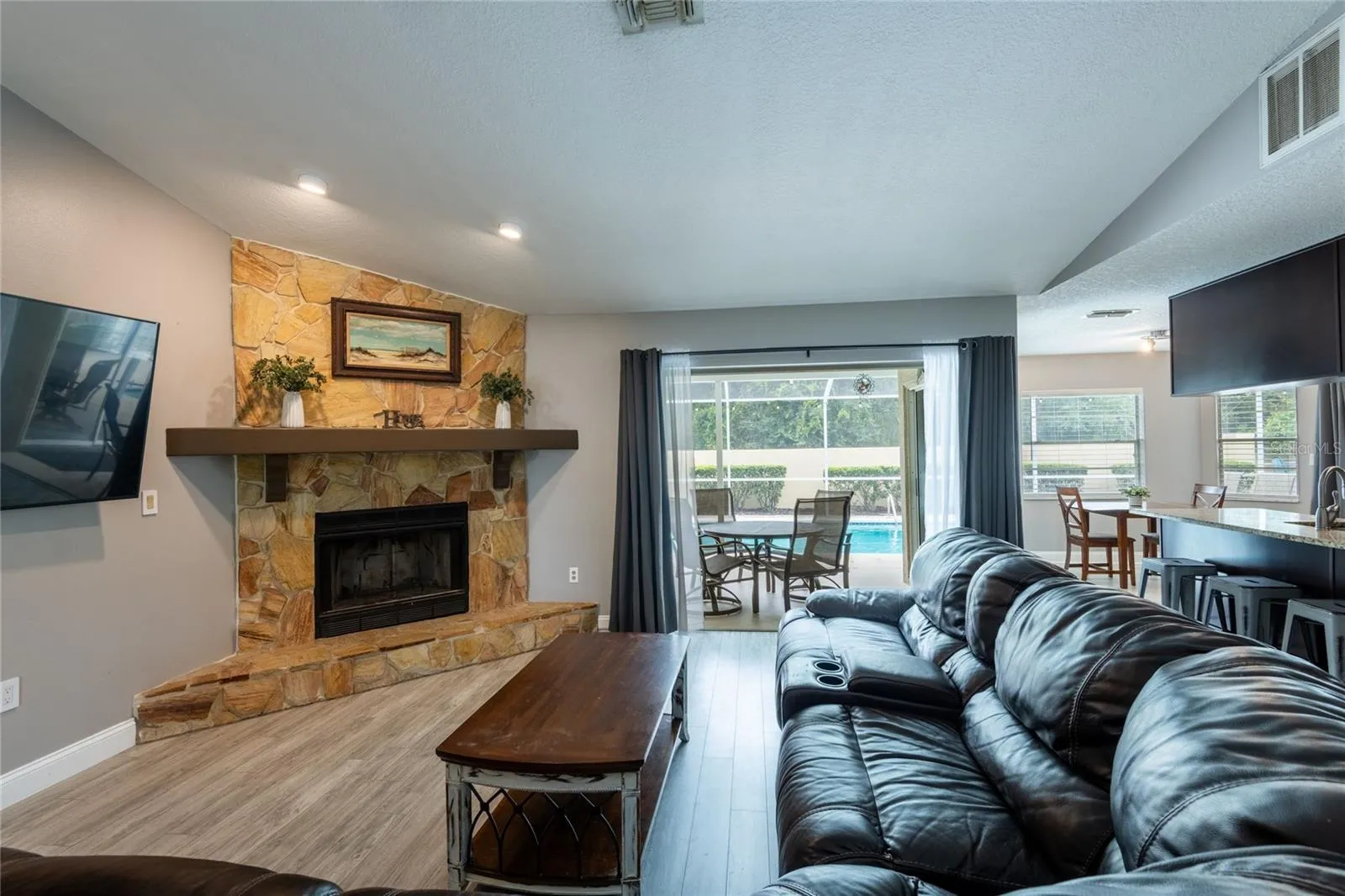 The great room is open to the kitchen and dinette area.
