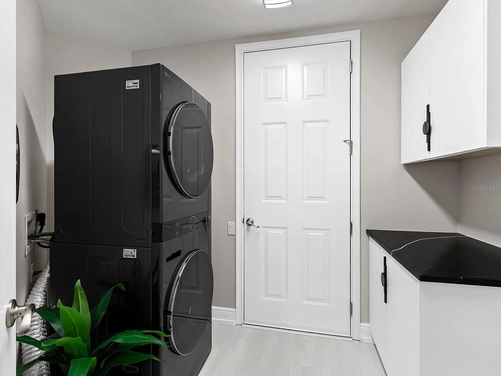 Laundry Room with a Folding Area and Newer W/D in 2025