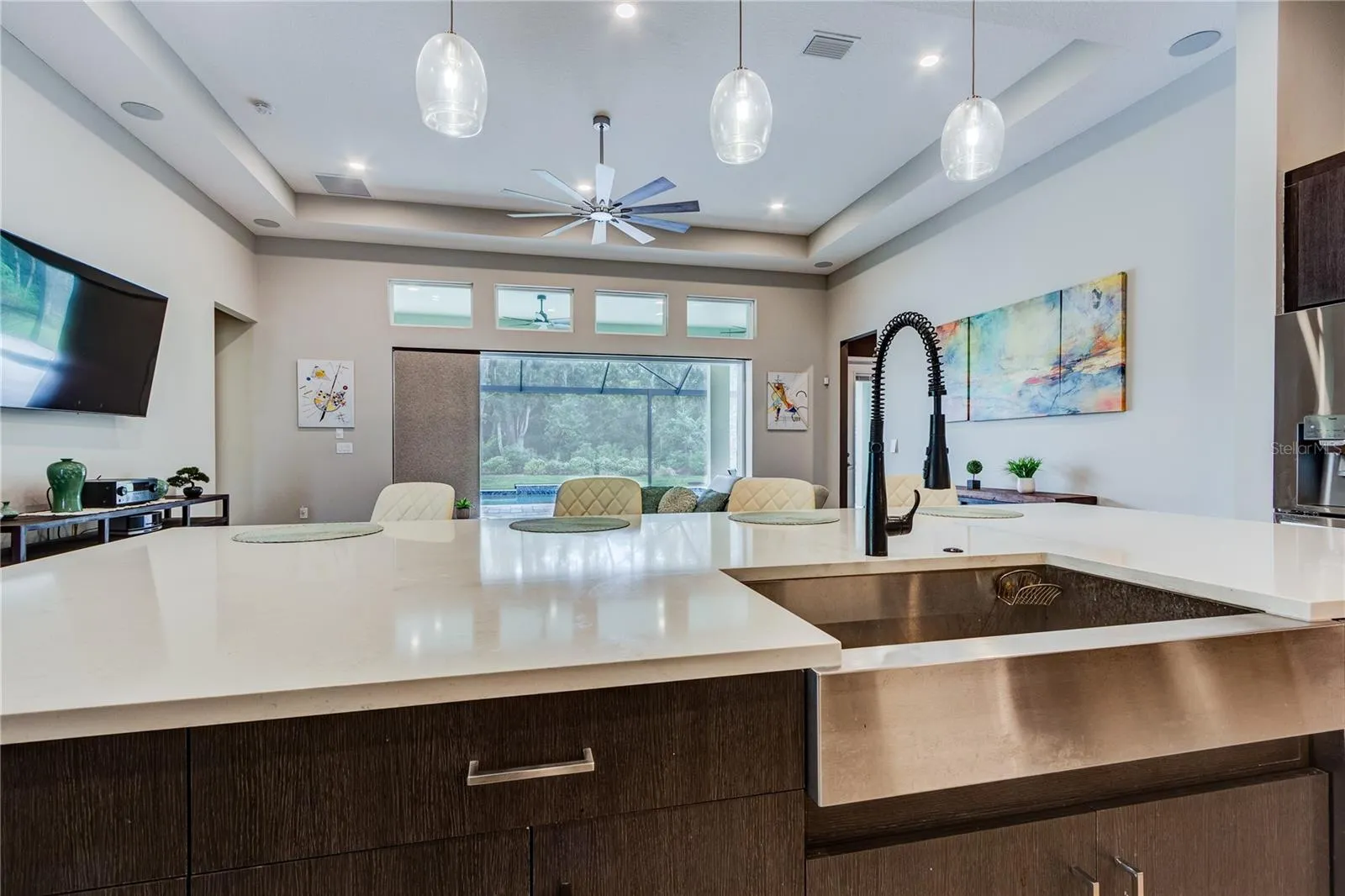Farmhouse stainless sink in quartz center island