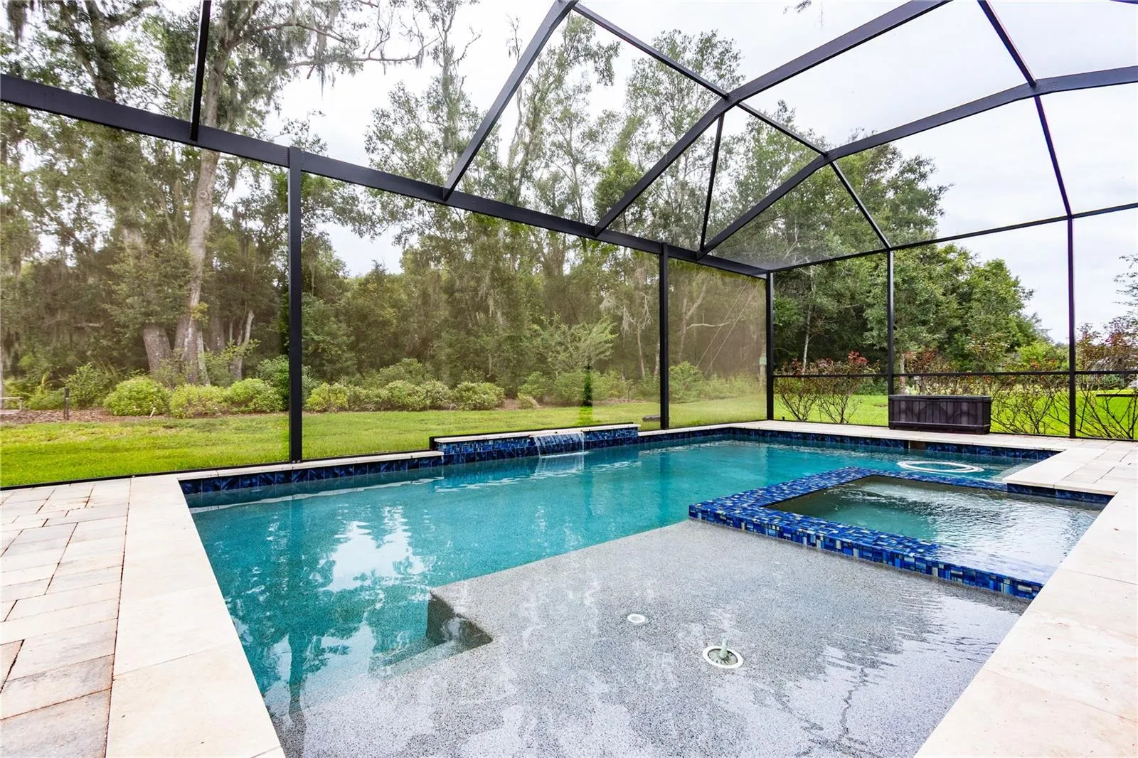 Sunshelf and heated spa inside the pool!
