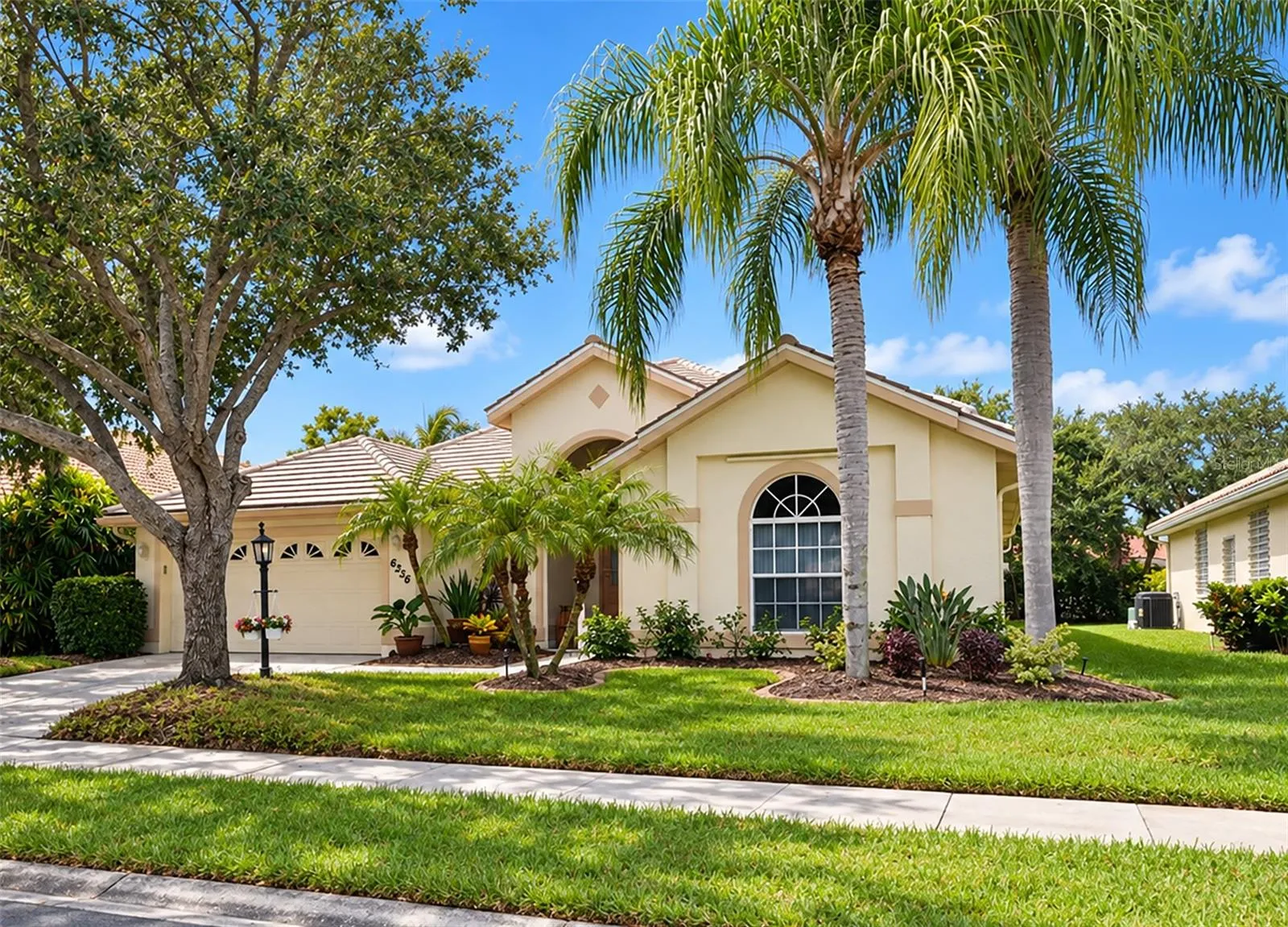 New tile roof 2026 w/ transferable warranty. Reclaimed irrigation.