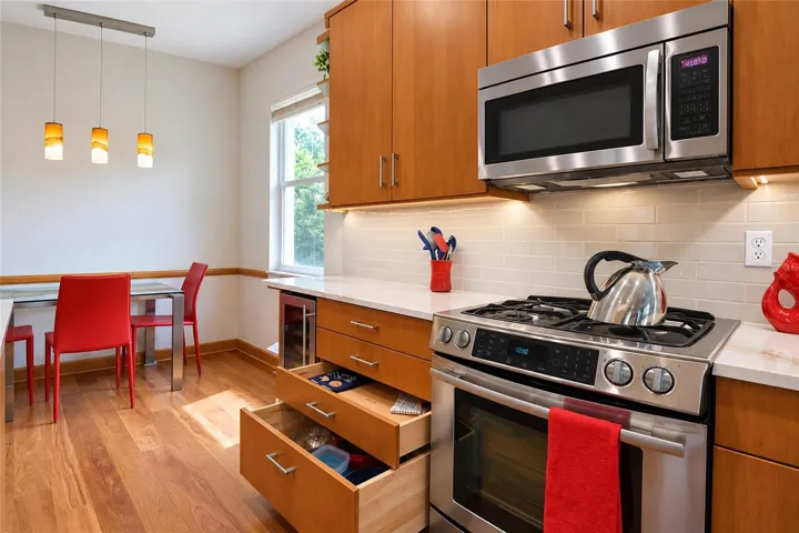 Natural gas range and soft close full extension drawers of dove tail construction.
