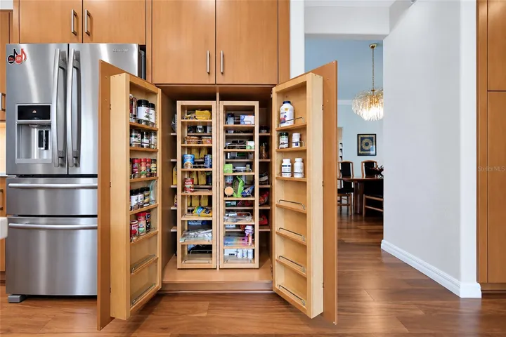 Multi-hinged cabinets w/smart design built ins.