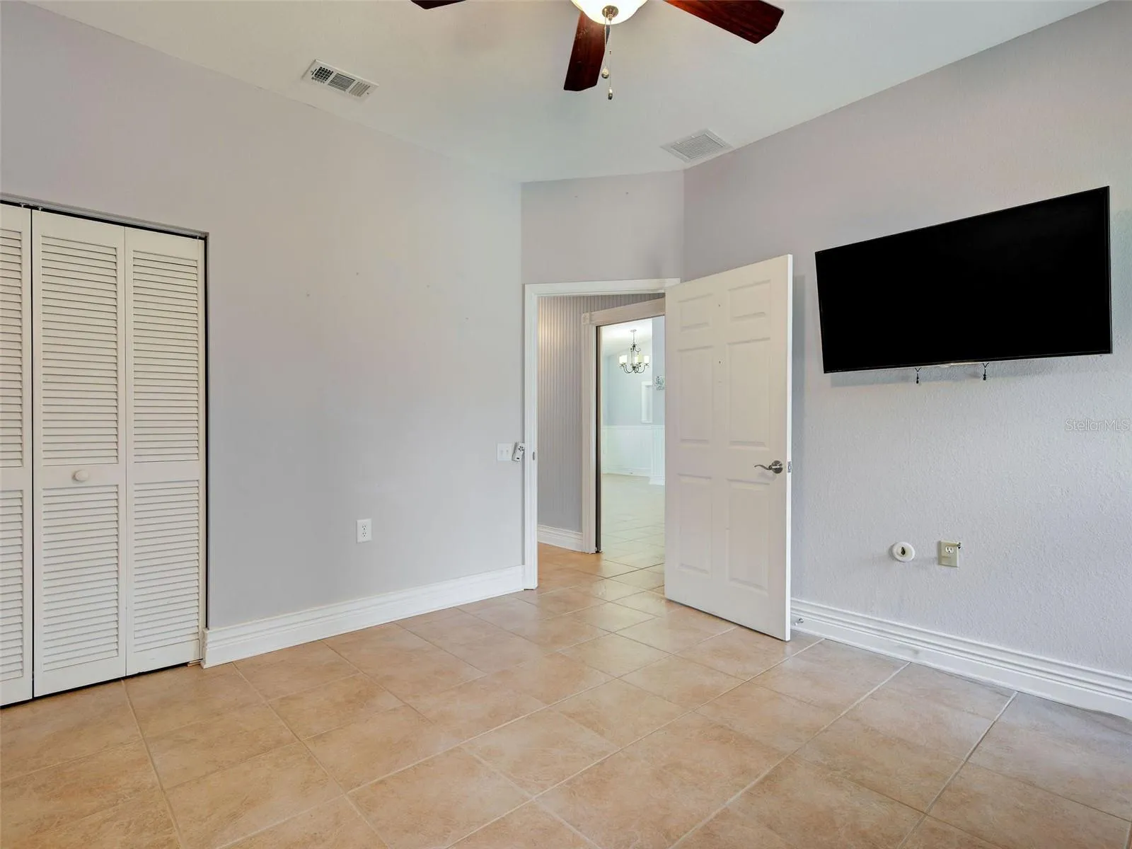 Second guest bedroom has a built in closet.