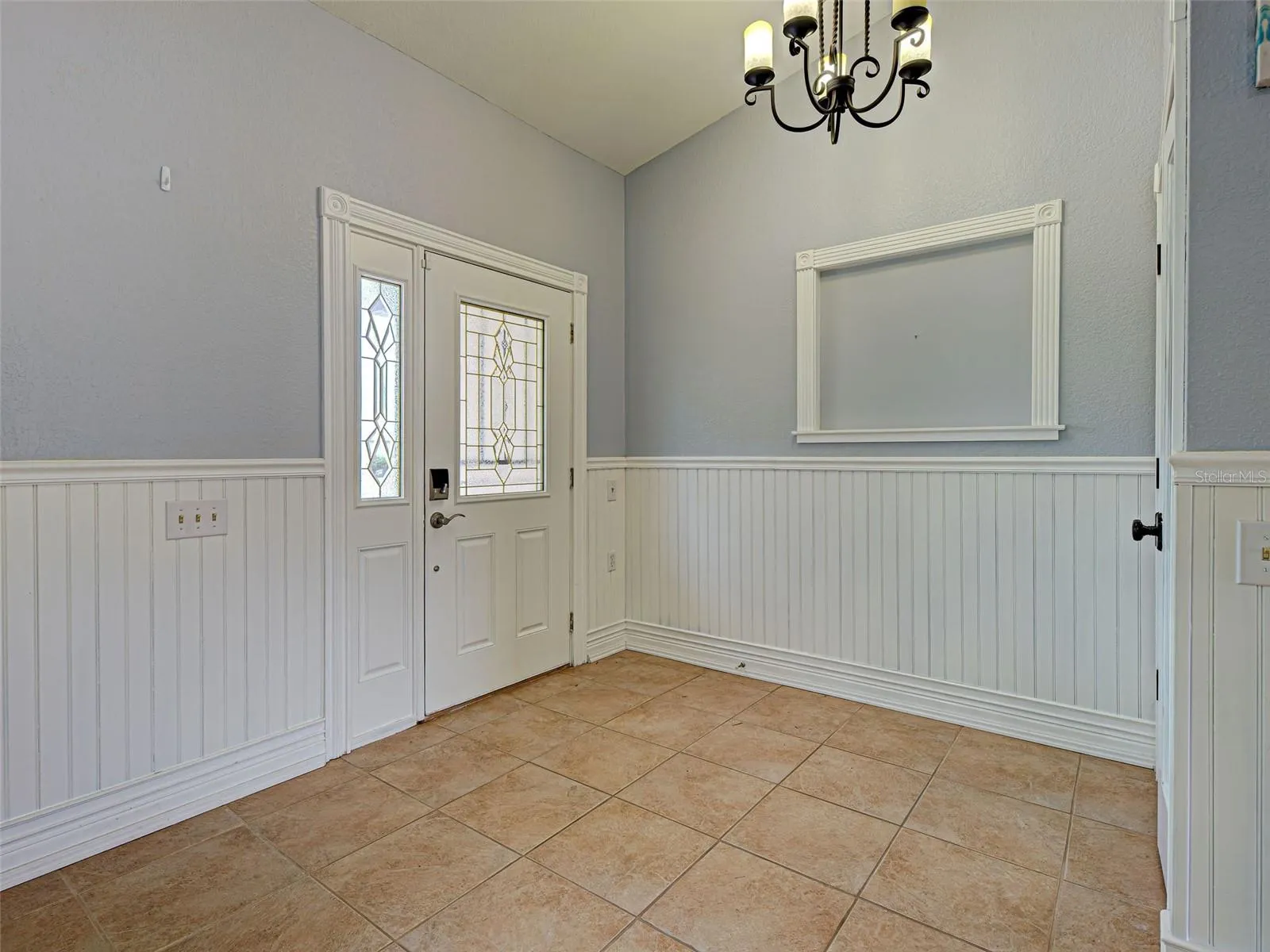The front door opens into a spacious foyer with a closet.