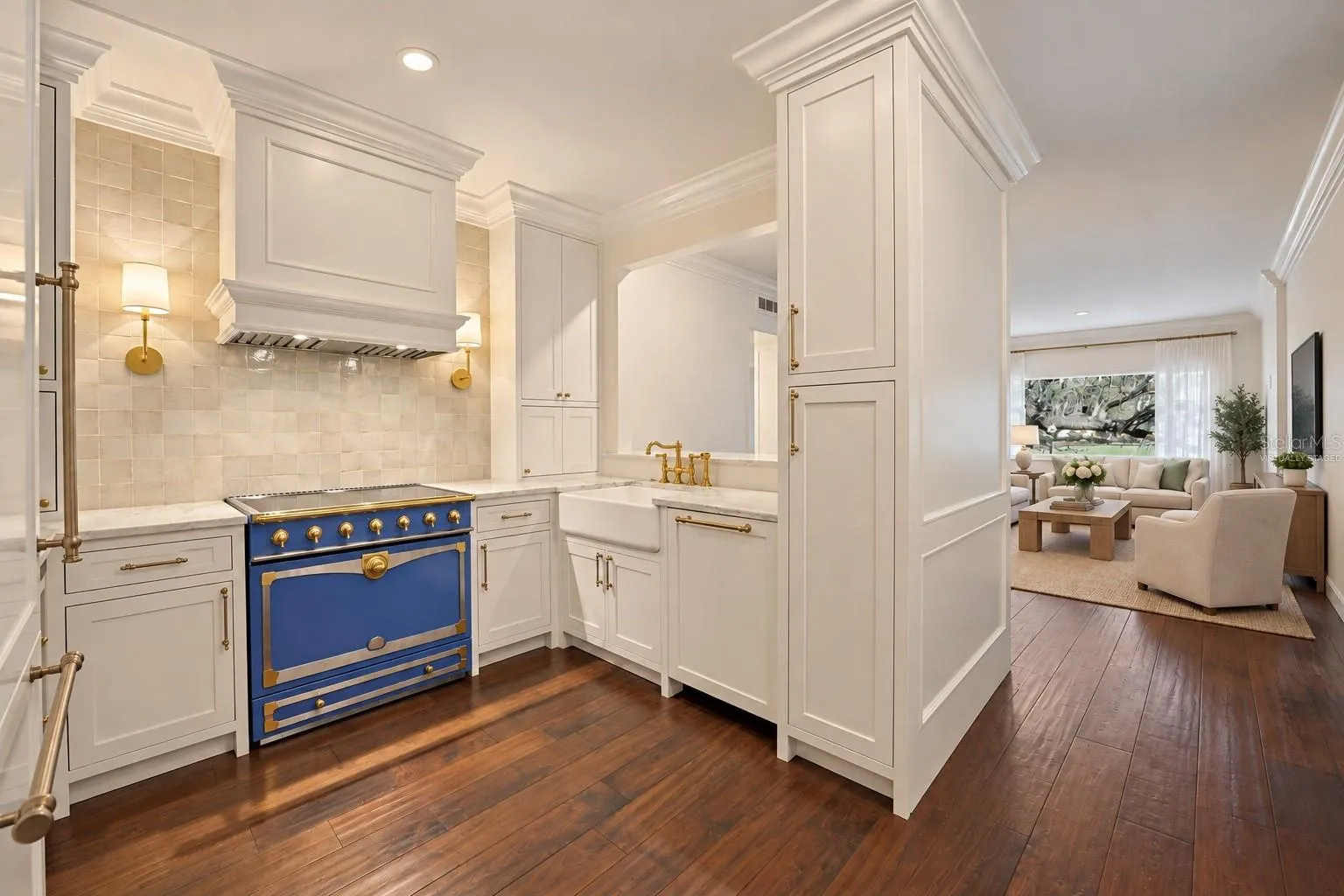Kitchen with pass-through into living room *virtually staged