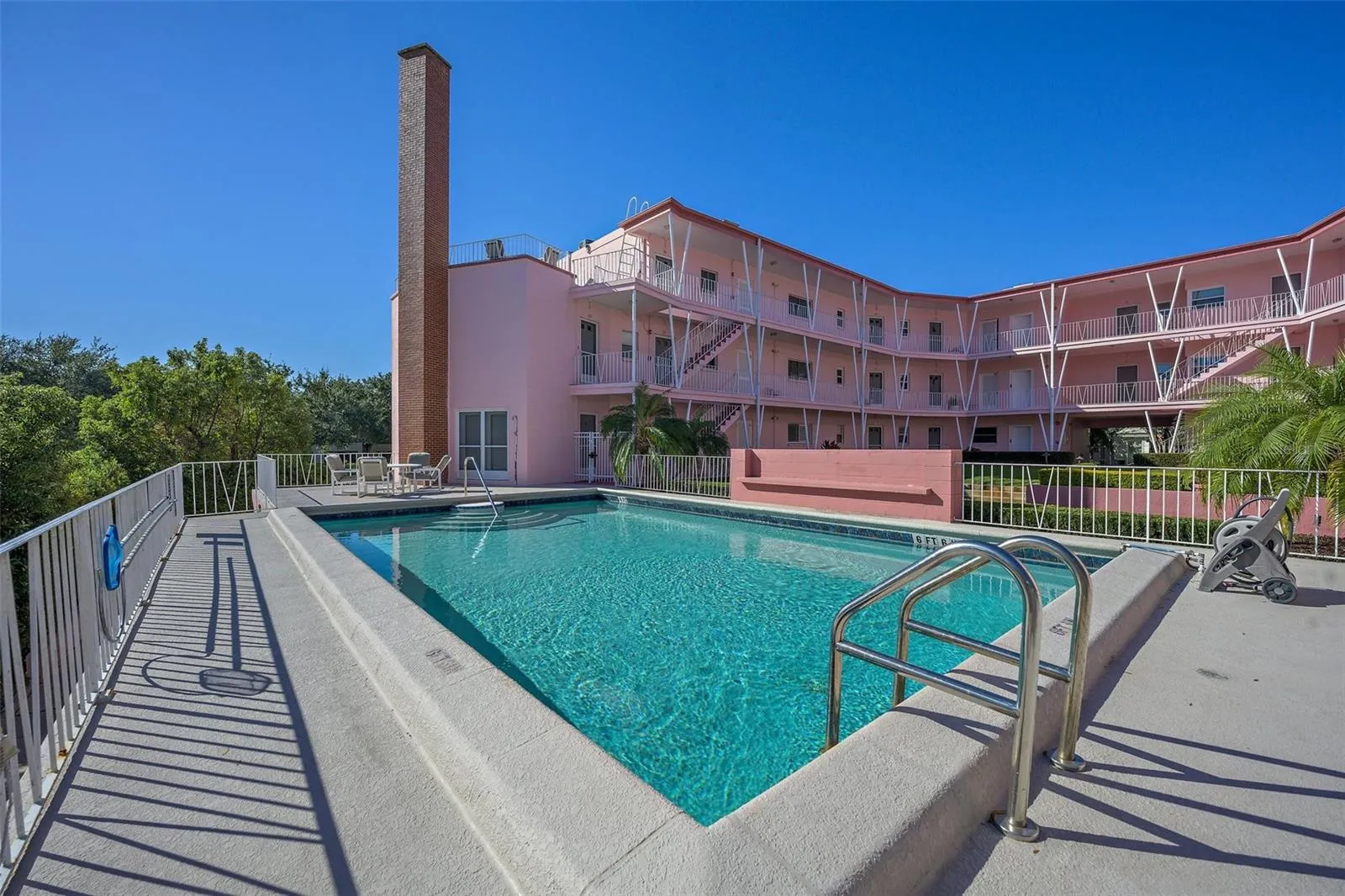 Community pool that is steps from your front door