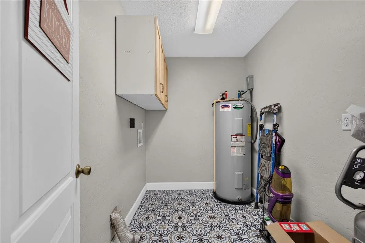 Spacious laundry and utility room in the main home