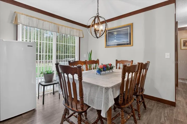 Lots of space here for even the largest of dining tables here in this designated dining area!