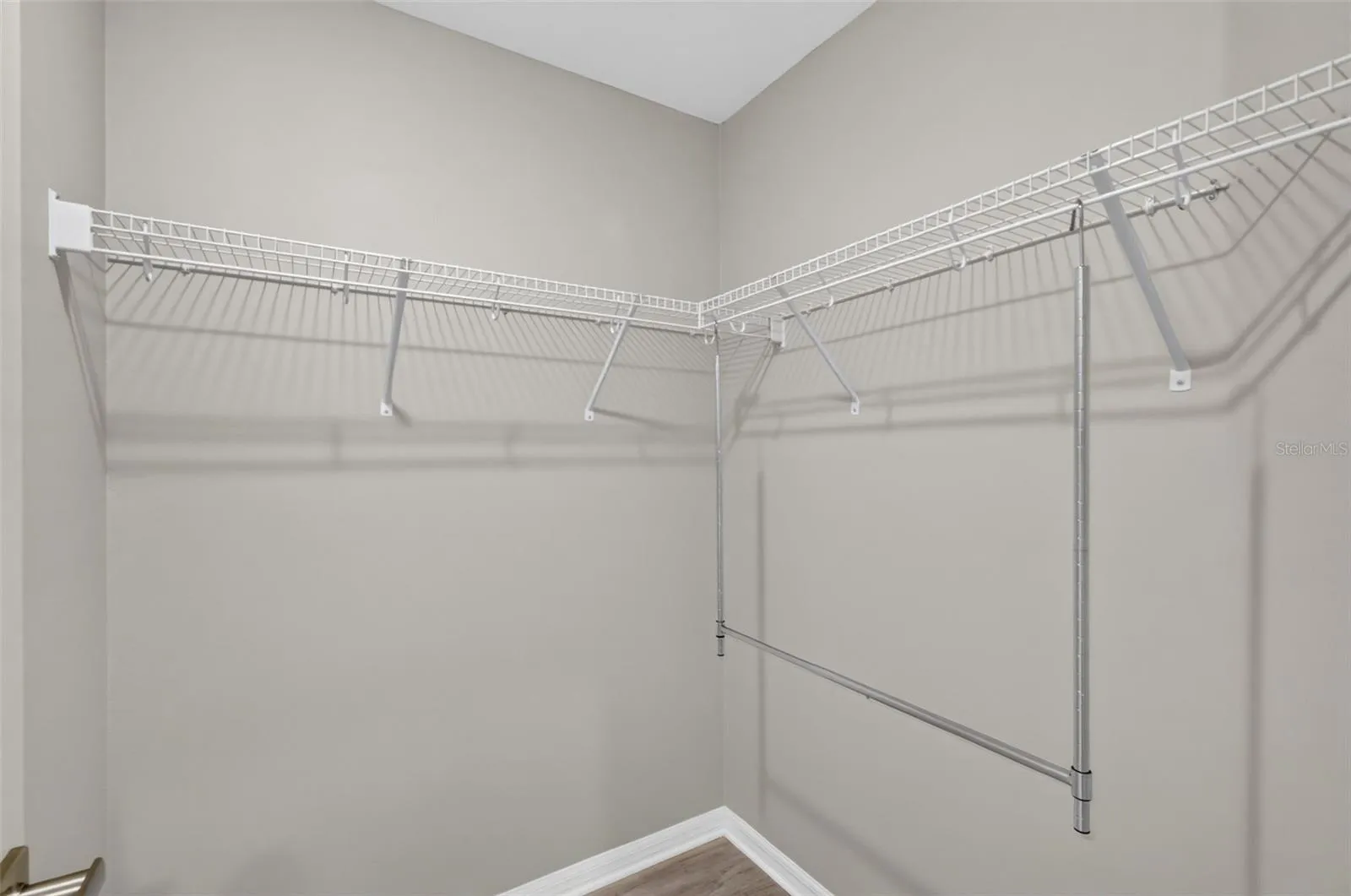 Primary Bedroom First Walk-In Closet
