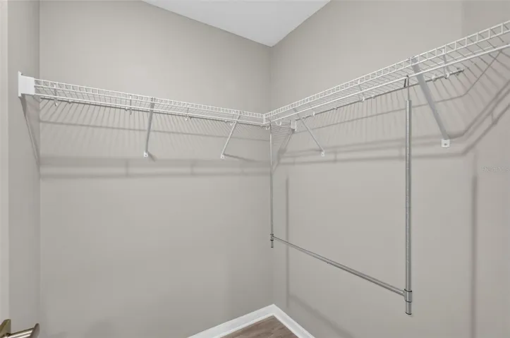 Primary Bedroom First Walk-In Closet