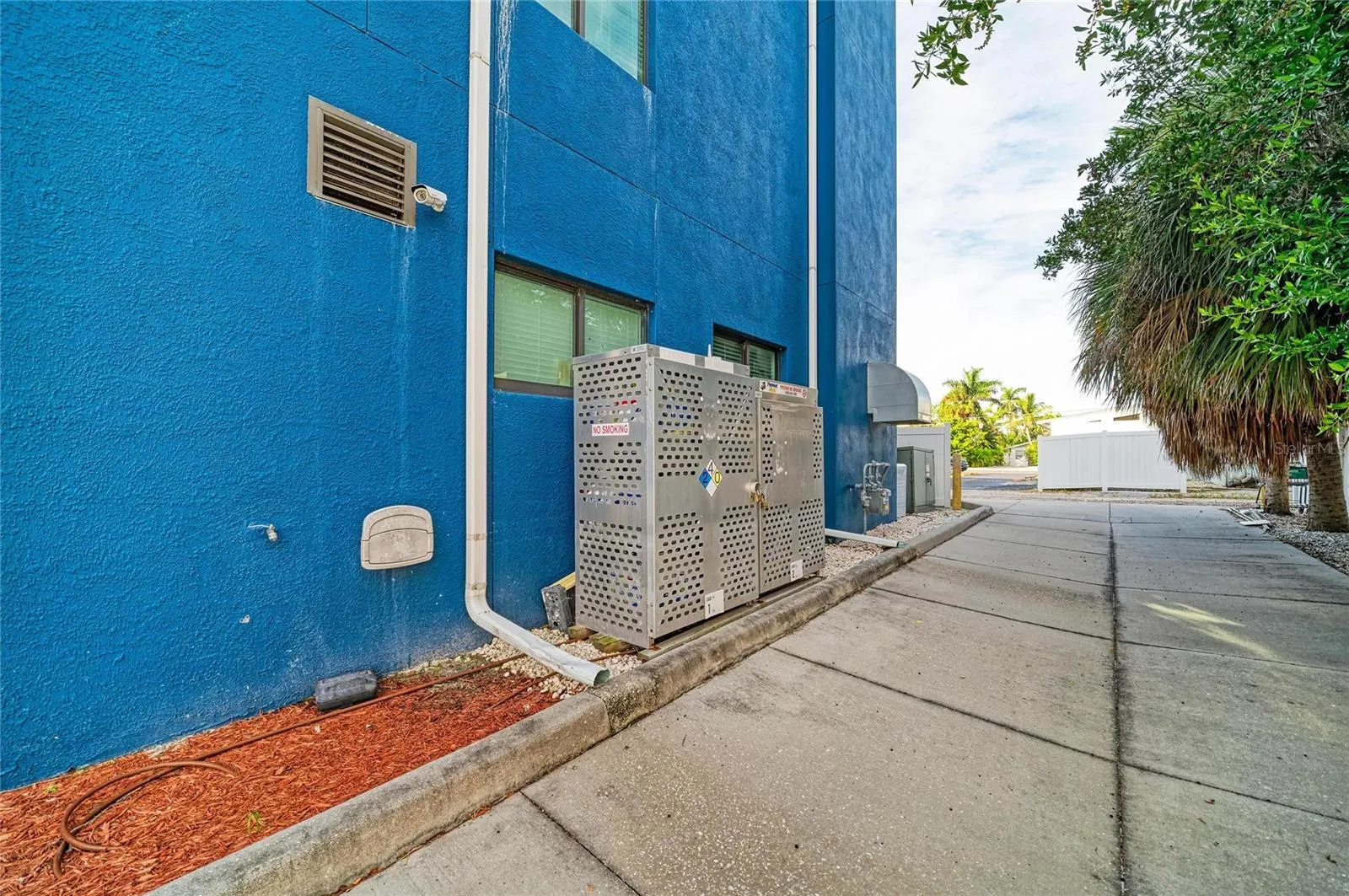 North side of building and through alley