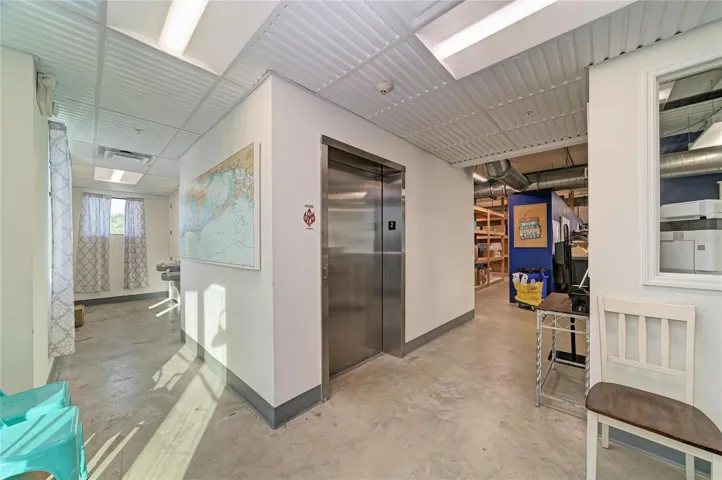 Lobby with bathrooms, egress and elevator