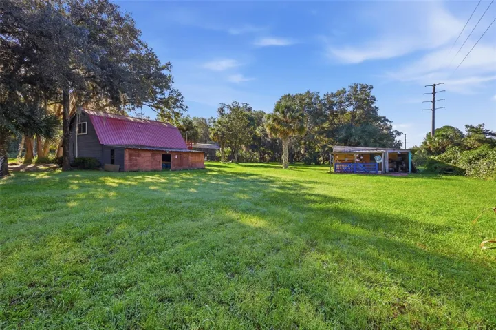 SIDE YARD - DETACHED GARAGE - STORAGE BARN