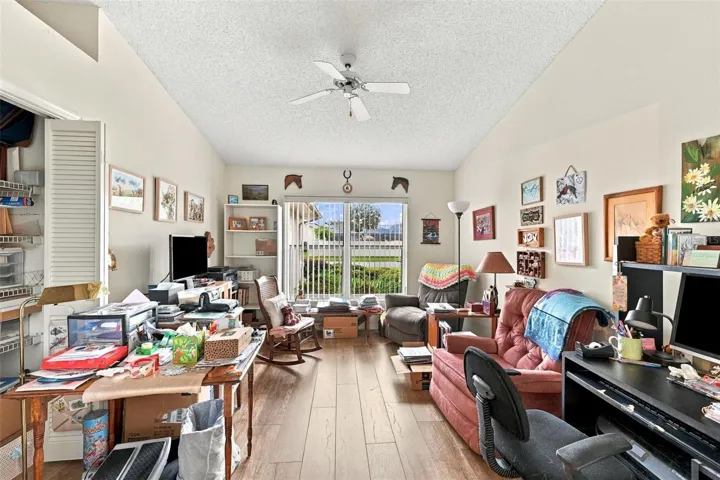 Third bedroom, currently used as a craft/Tv room