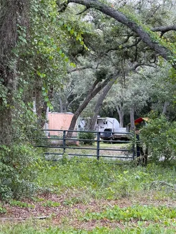 Side gate Baxley Dr