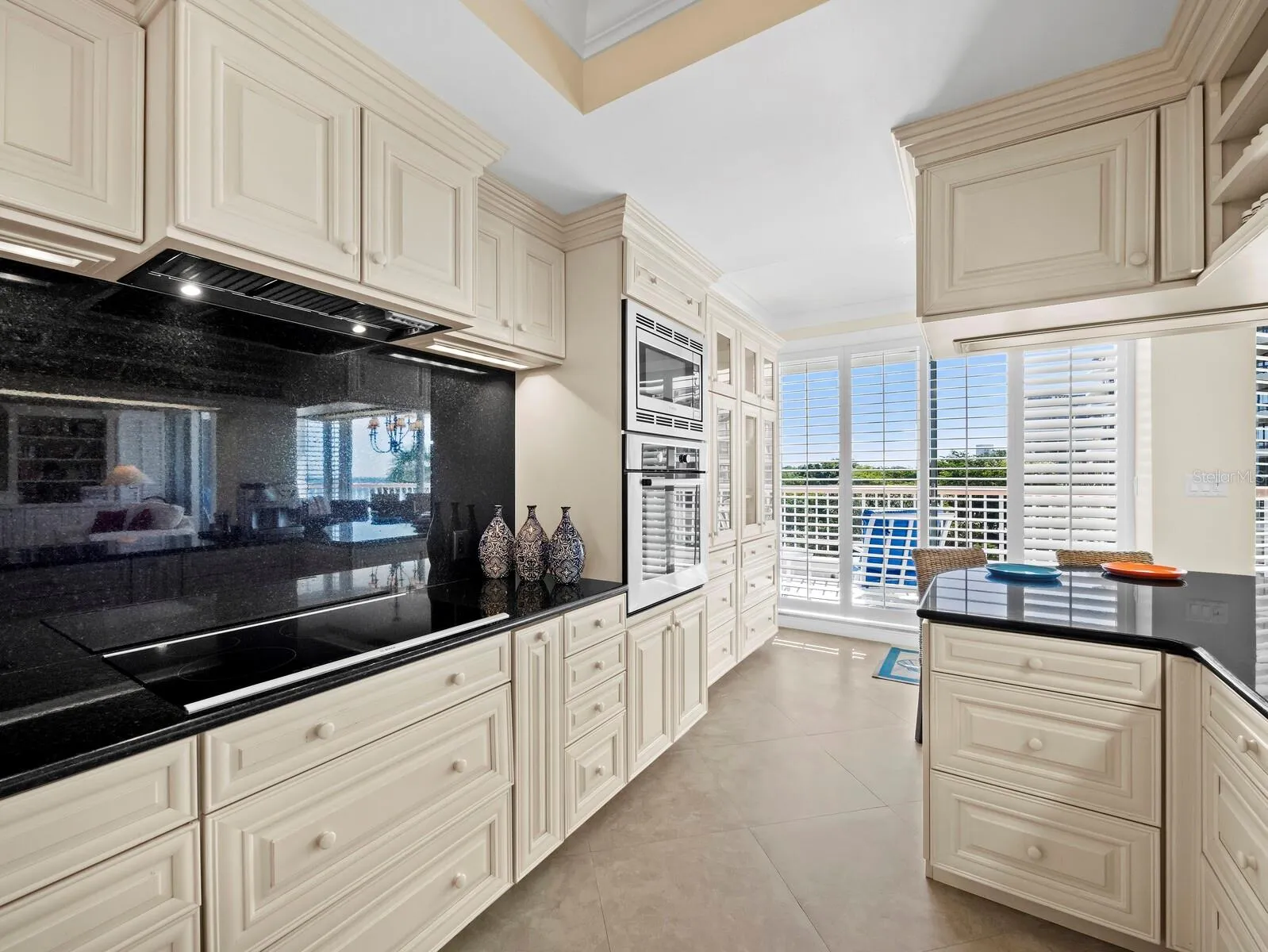 Kitchen highlights include Bosch appliances, expansive counter tops  and tremendous storage