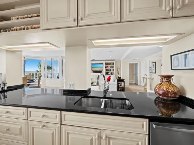 Kitchen with views to the living area and the Gulf beyond