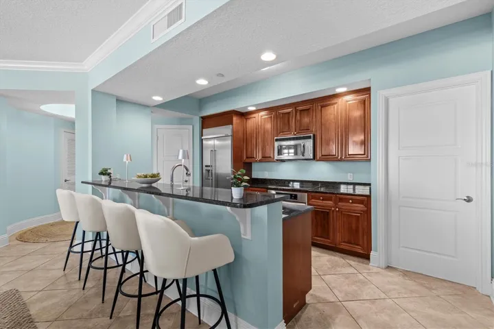 Fully stocked kitchen with generous storage and a walk-in pantry.