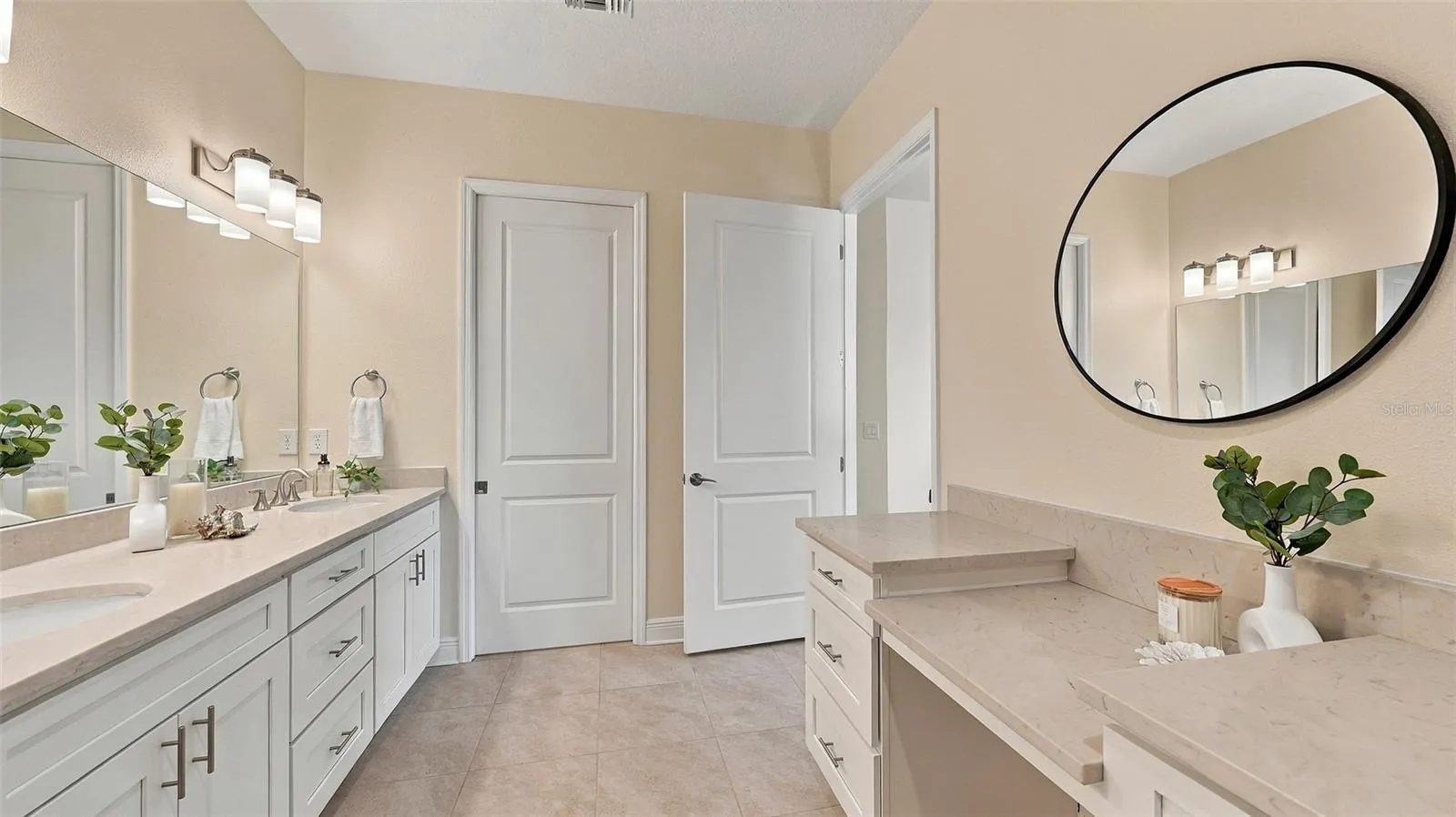 Upgraded primary bathroom with large shower and vanity