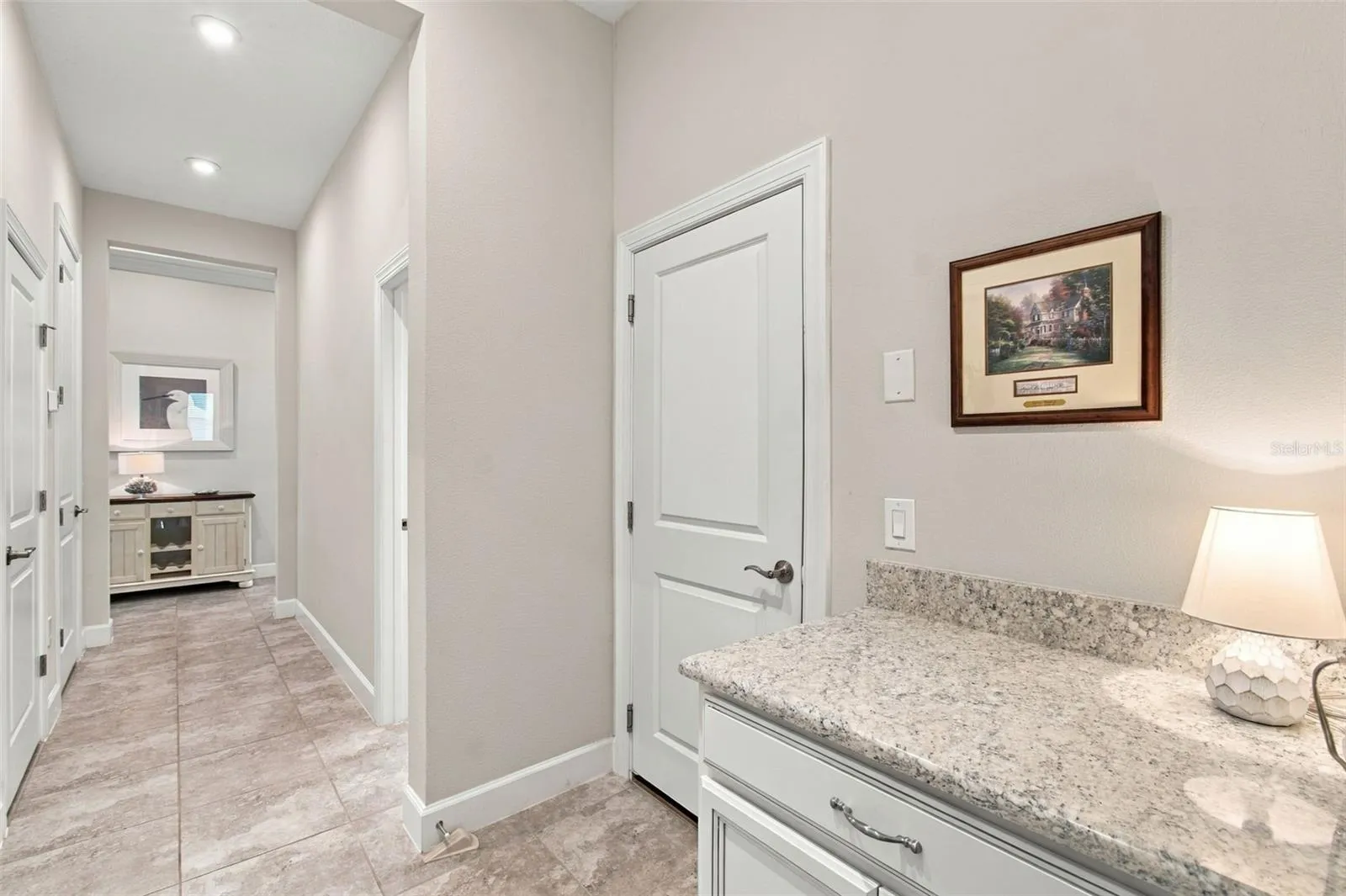 Hall from Garage with Drop station cabinet
