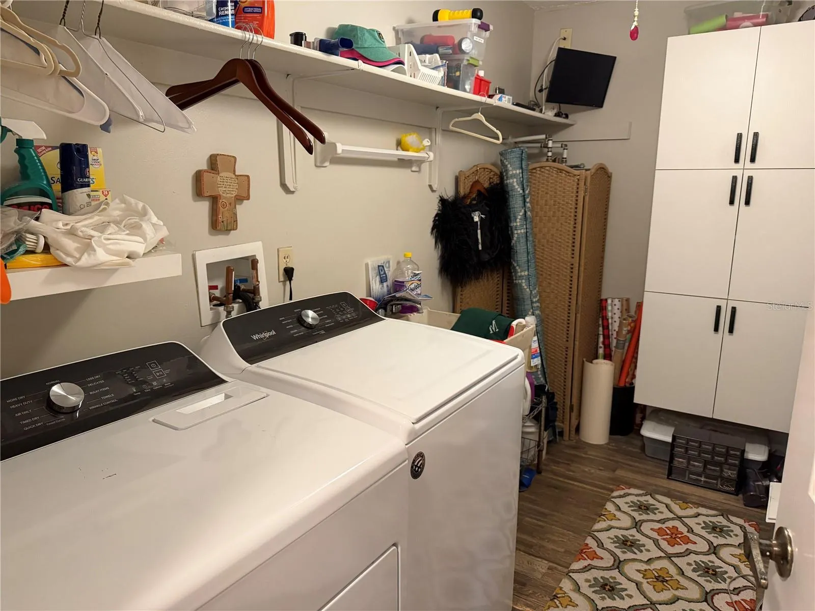 Inside launfry room with utility sink
