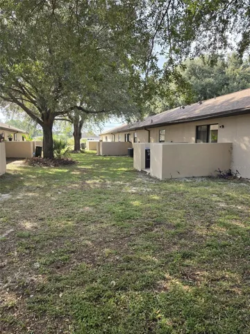 Shaded courtyard behind the units