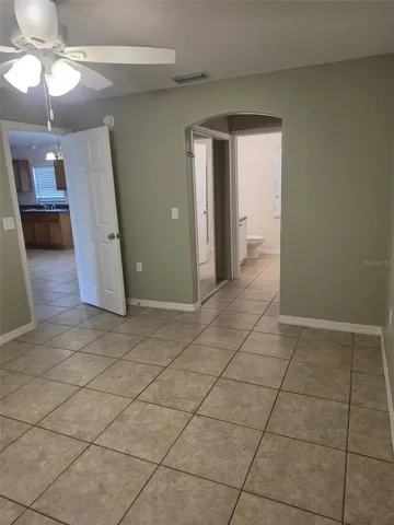 Primary bedroom with closet and private bath
