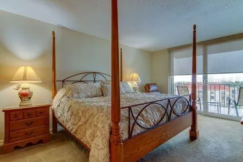 Primary Bedroom with sliding doors to balcony