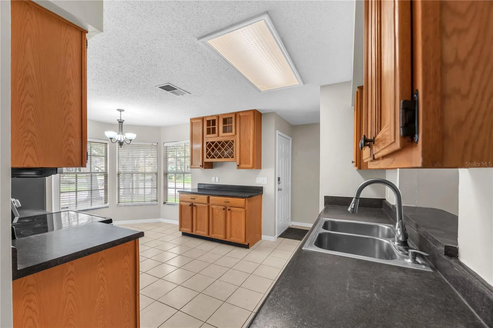 Built in wine rack and lots of counter work room and cabinets.