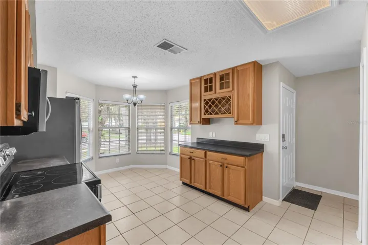 A closer look at the bump out eat-in kitchen area.
