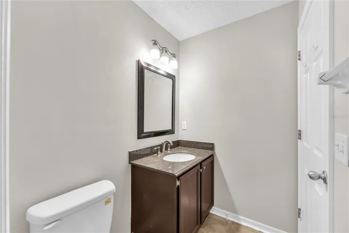 This half bath is attached to bedroom 3.