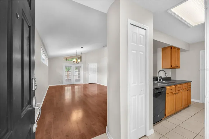 Come in a take a look around. From the foyer, you can see the living/dining area straight ahead and the kitchen is on the right.