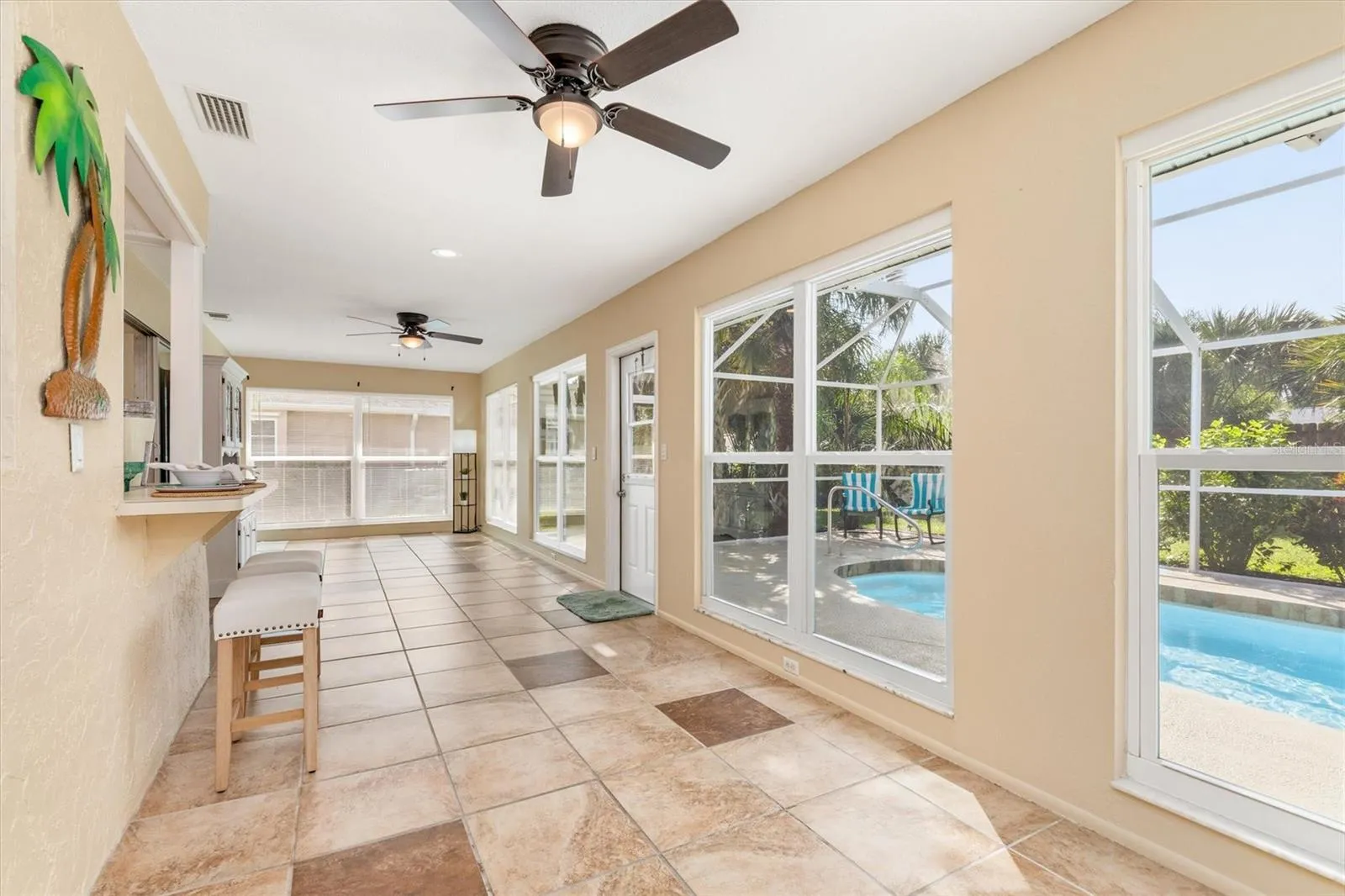 1/2 views of Florida room/lanai