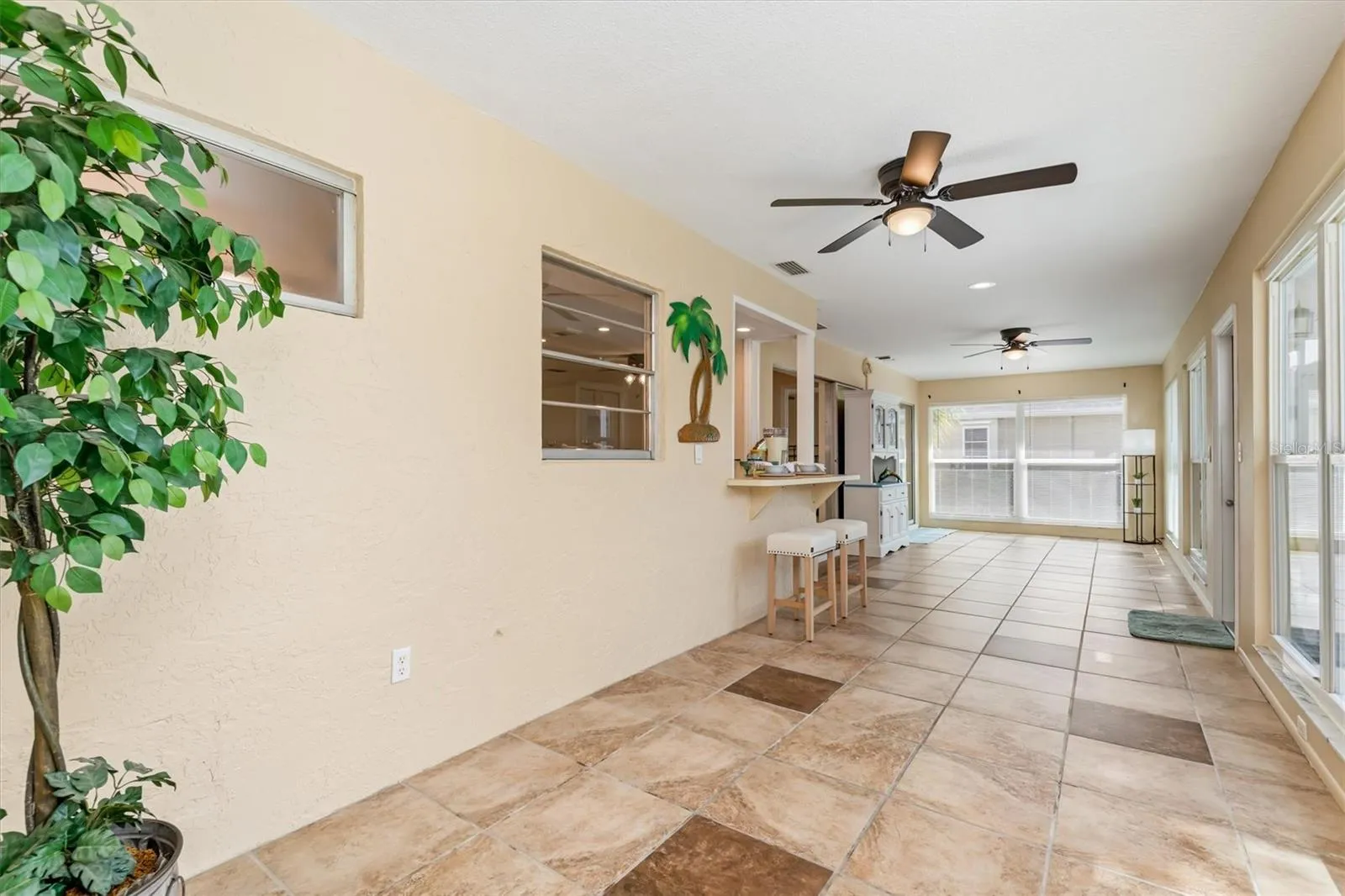 1/2 views of Florida room/lanai