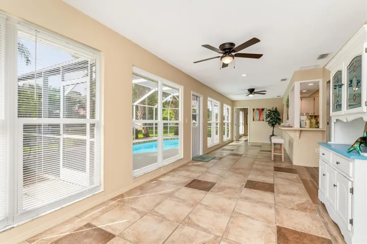 full view of lanai with WINDOWS and natural light